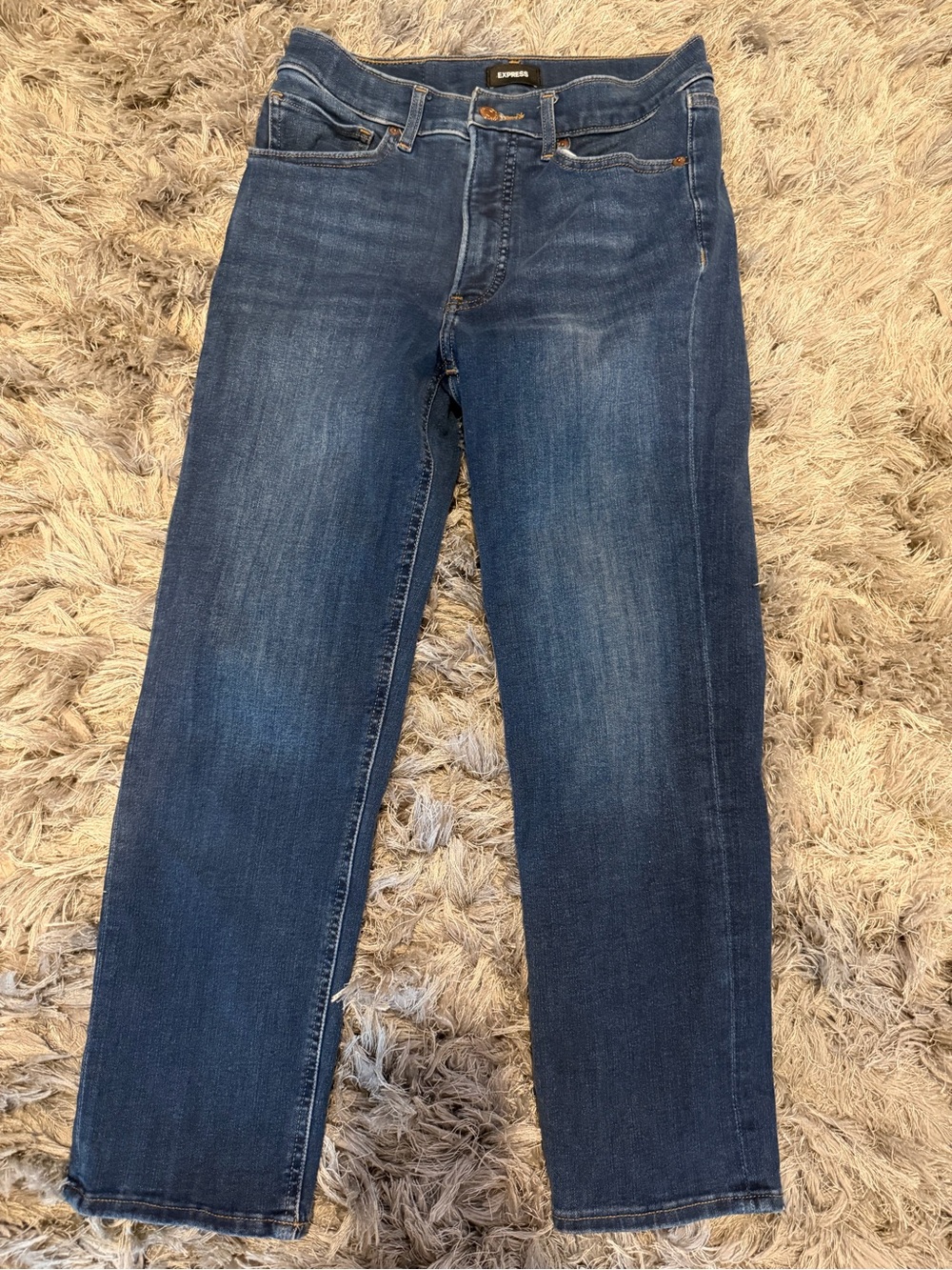 Express woman’s straight high-rise four way hyper stretch cropped jeans